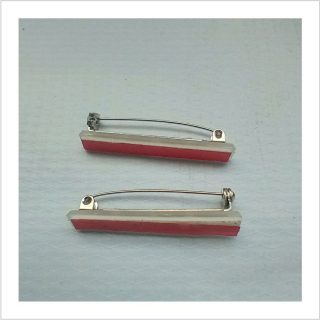 Red name tag pin with gum